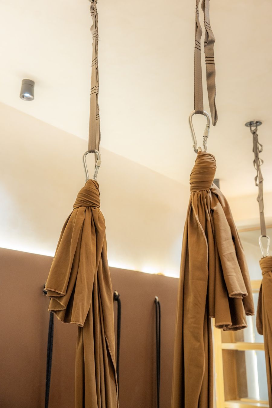 Aerial silks hanging from the ceiling